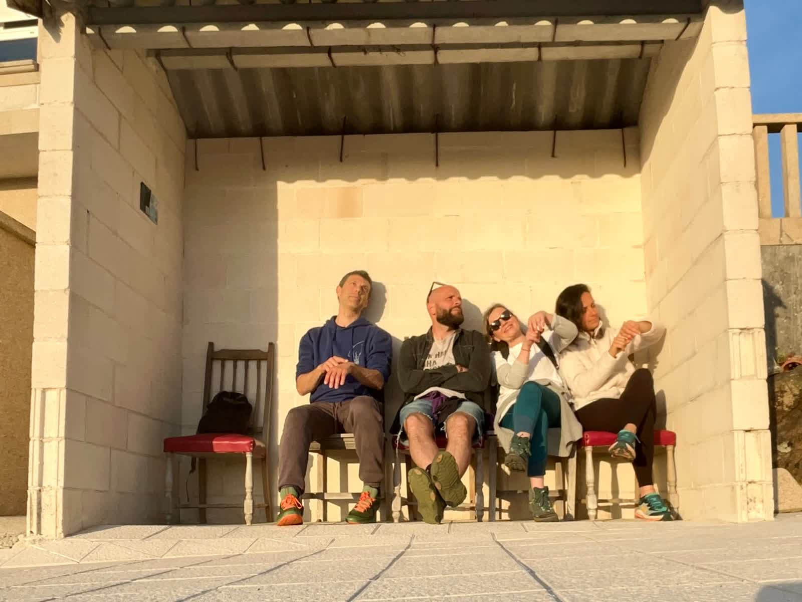 The Casa Mestra team resting at sunset
